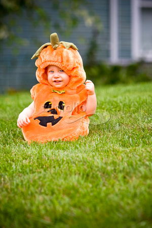 Boy in pumpkin costume